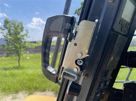 skid steer overhead door vs swing door|skidloader door handles.